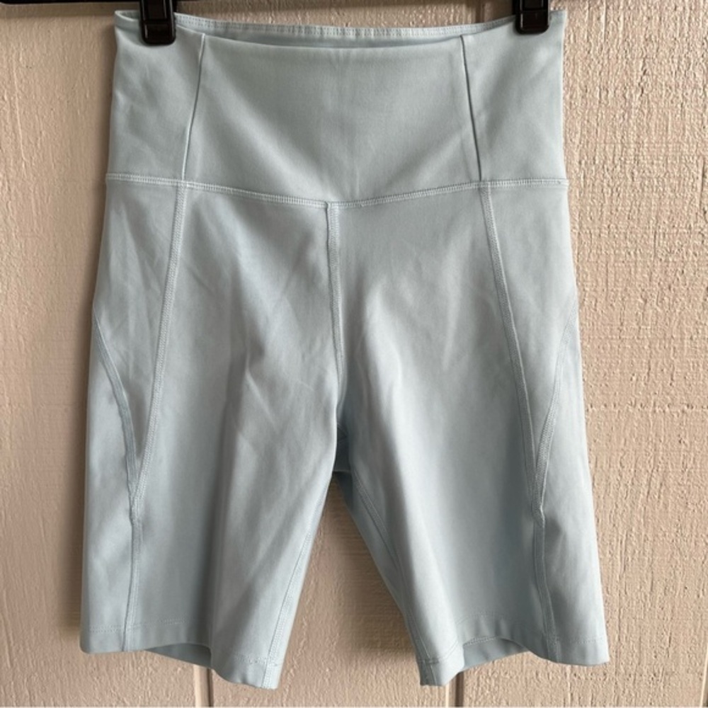 Girlfriend Collective’s Compressive High Rise Bike‎ Shorts in Agave Light Blue S
